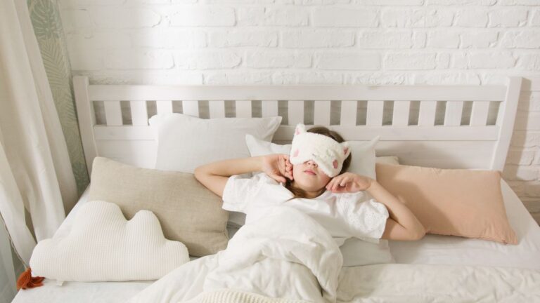 Person sleeping peacefully in bed